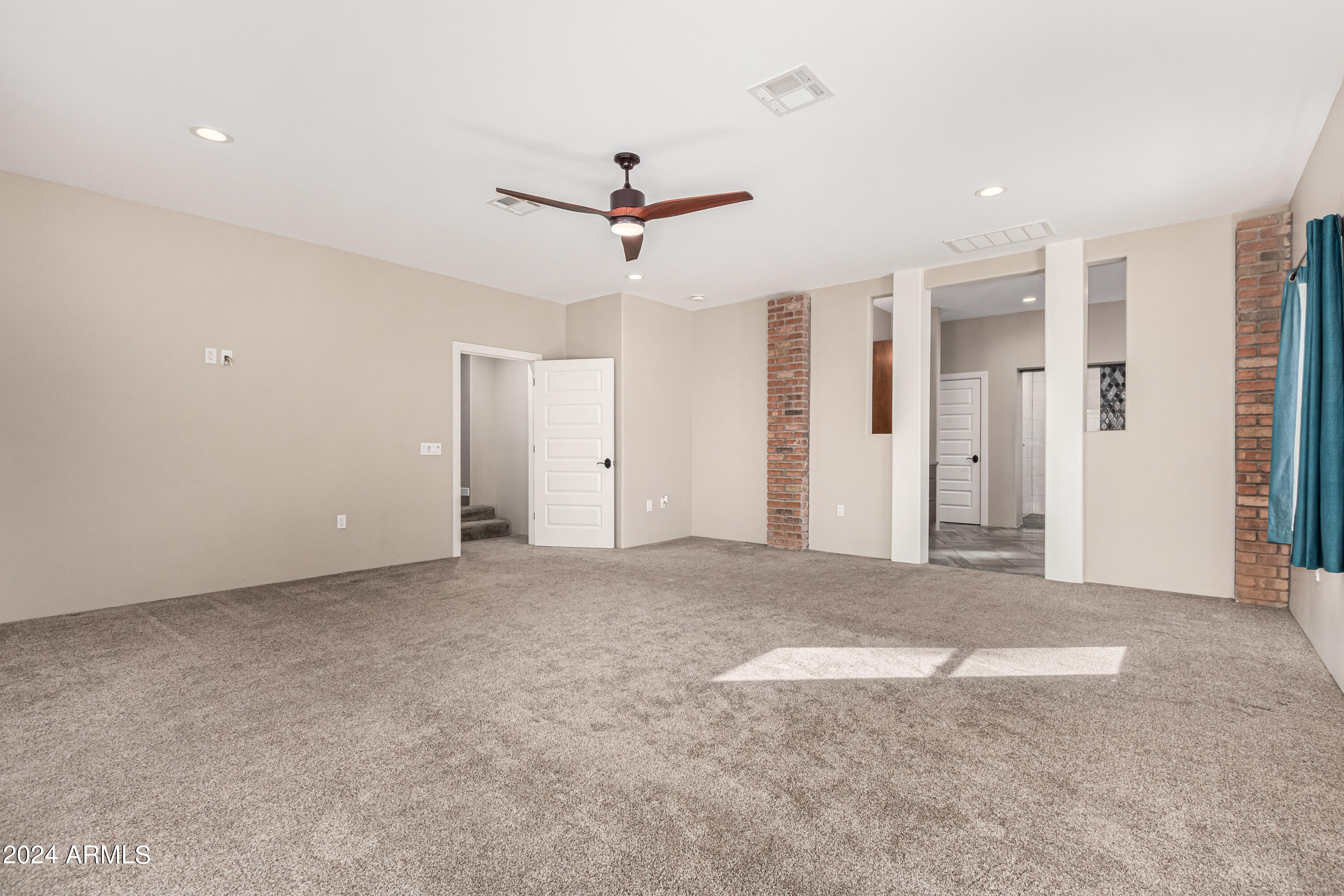 2386 East Redfield Road Gilbert, AZ 85234 - Photo 27 of 107 a view of empty room with ceiling fan