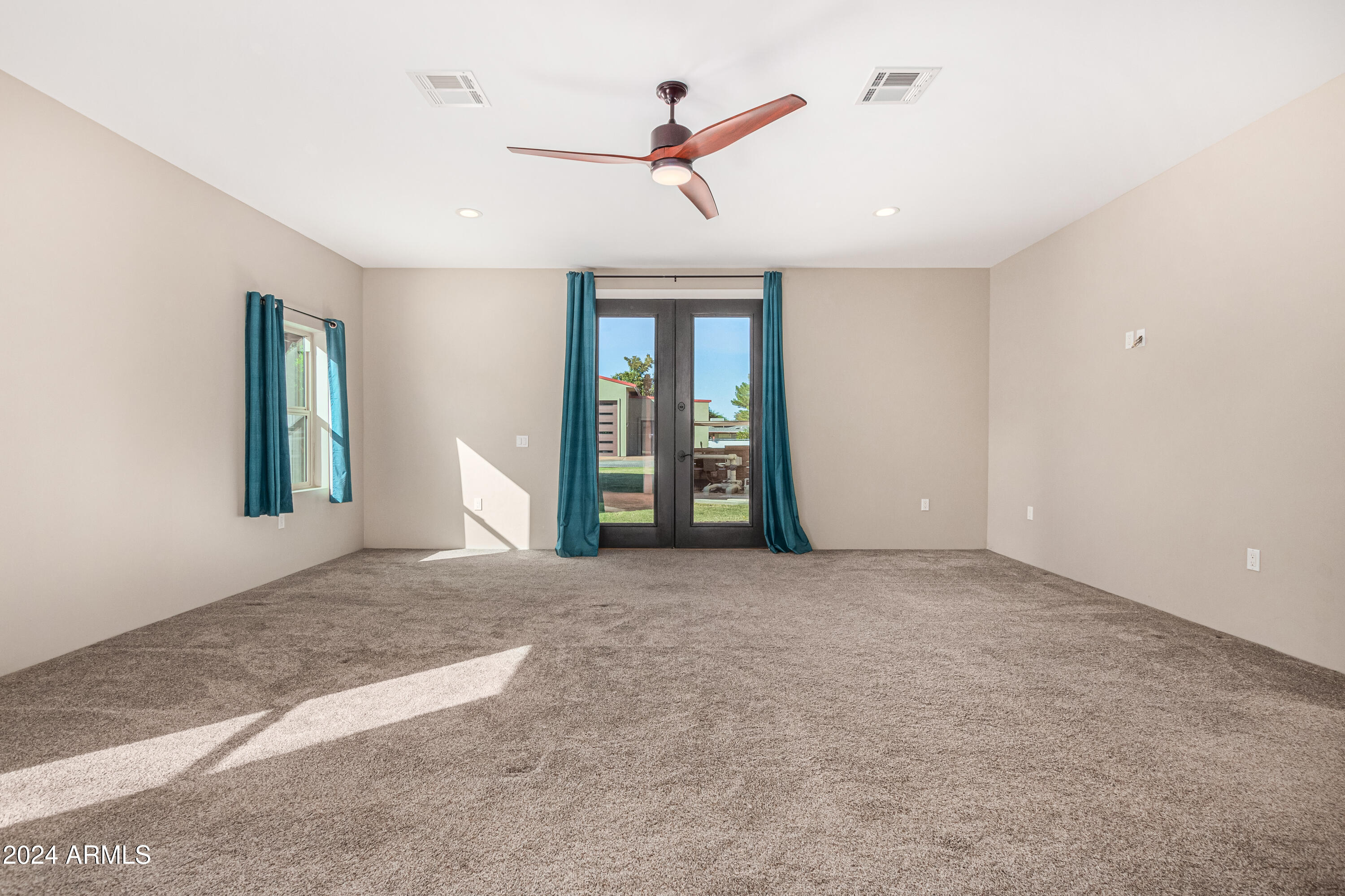 2386 East Redfield Road Gilbert, AZ 85234 - Photo 28 of 107 a view of an empty room with a window