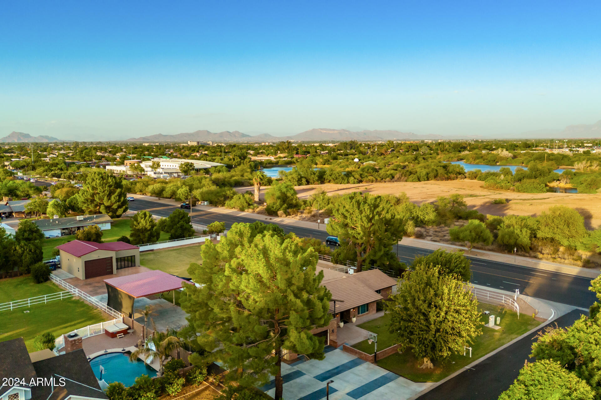2386 East Redfield Road Gilbert, AZ 85234 - Photo 86 of 107 an aerial view of residential houses with outdoor space