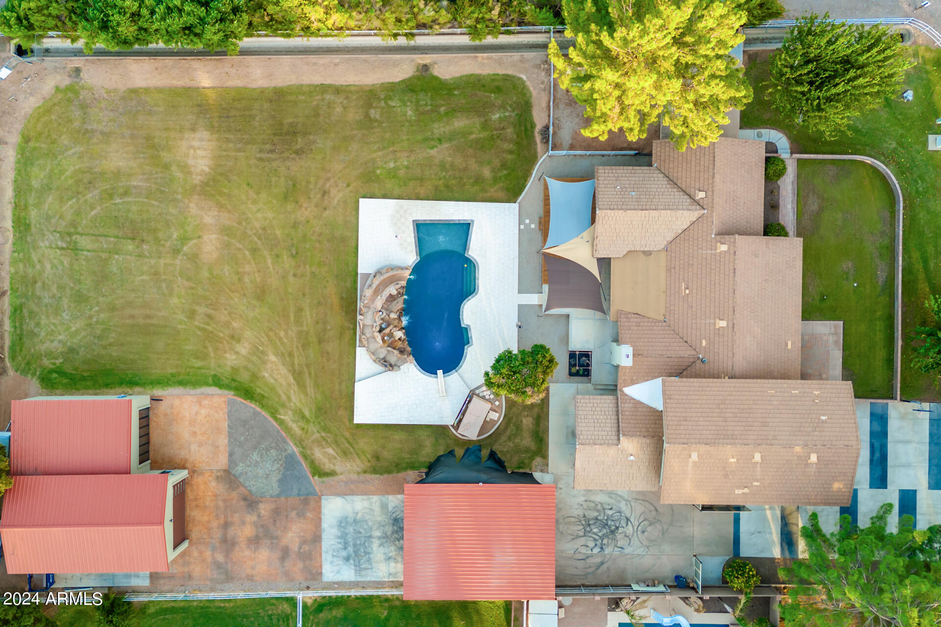 2386 East Redfield Road Gilbert, AZ 85234 - Photo 87 of 107 an aerial view of residential houses with outdoor space and swimming pool