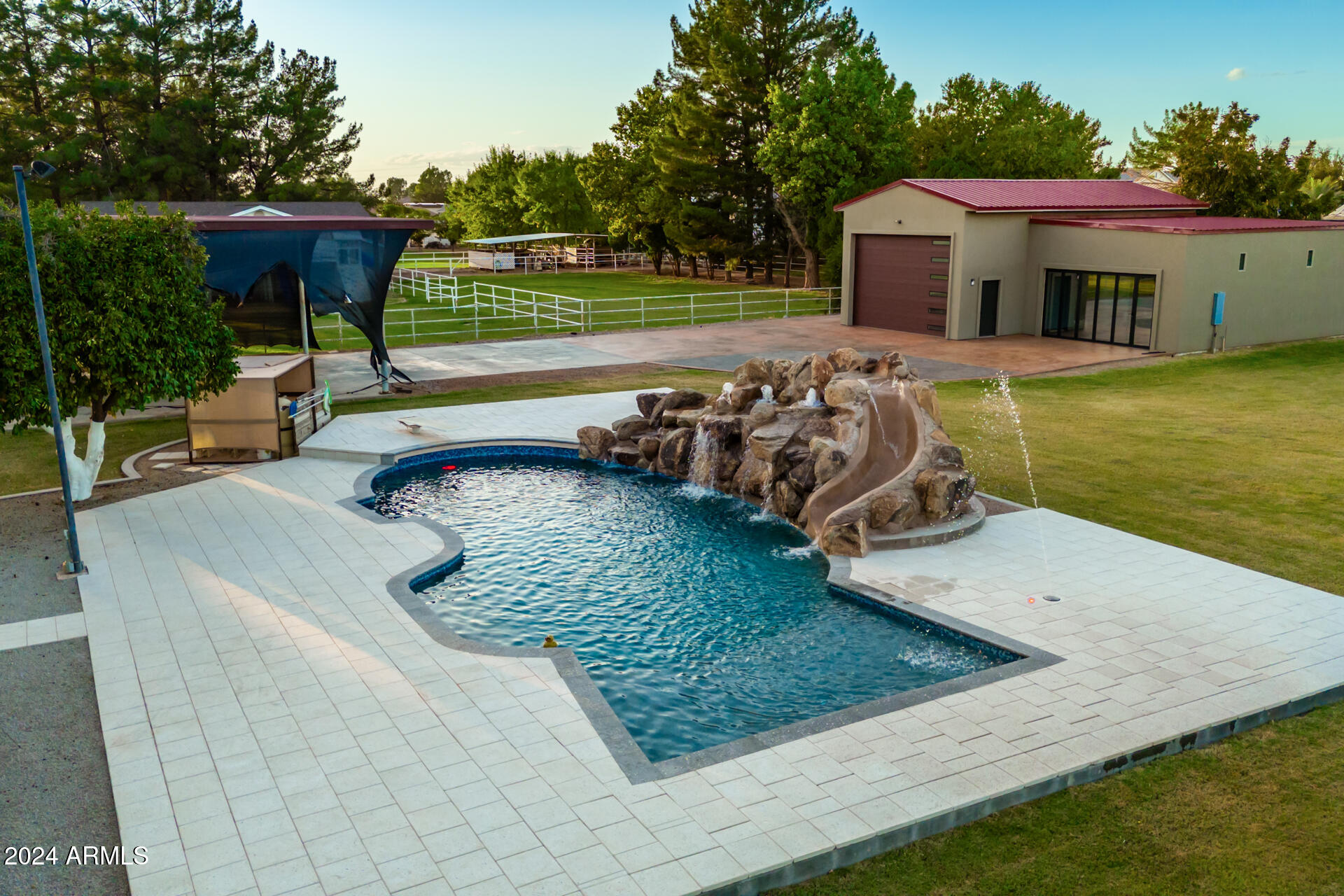 2386 East Redfield Road Gilbert, AZ 85234 - Photo 92 of 107 a view of a swimming pool with a patio