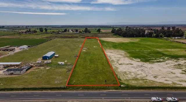 a view of swimming pool with a yard