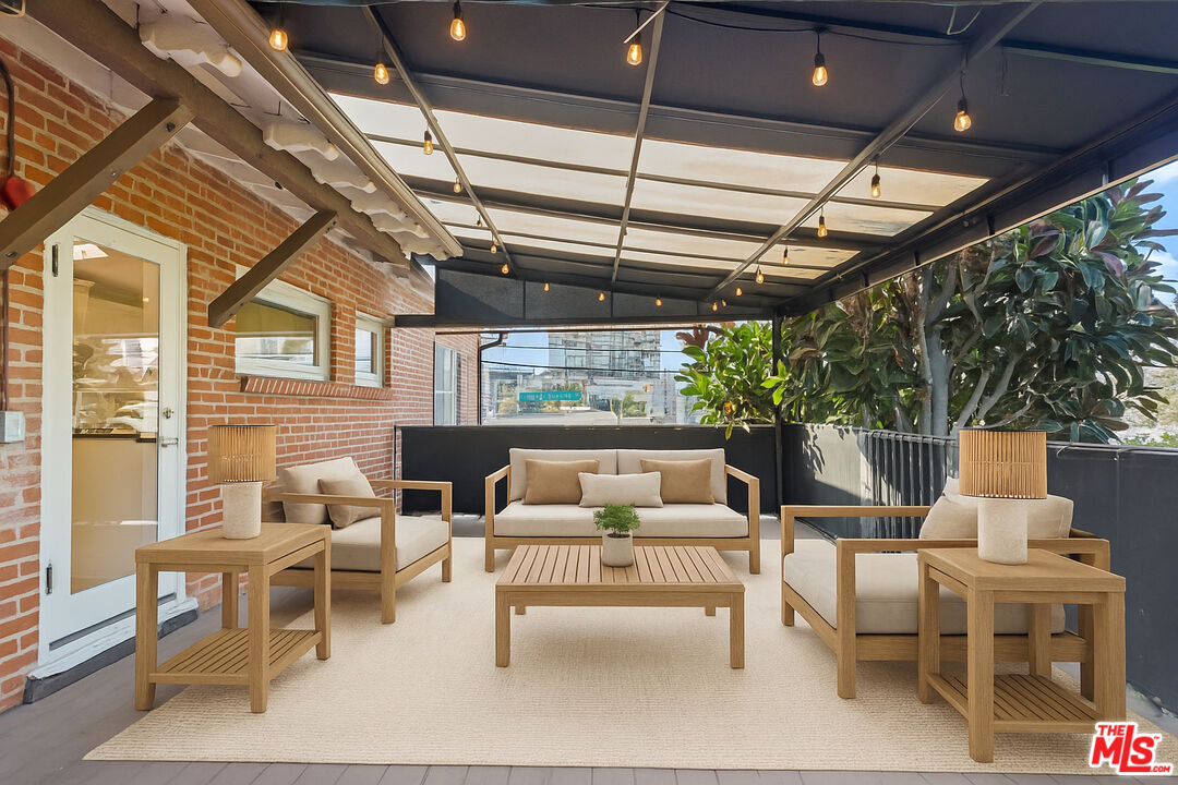 8467 West 4th Street Los Angeles, CA 90048 - Photo 5 of 12 a outdoor space with patio lots of furniture