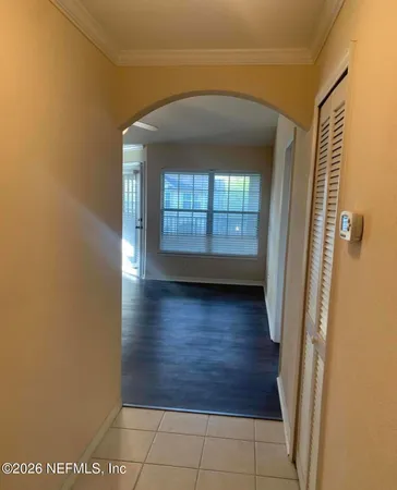 a view of entryway with wooden floor