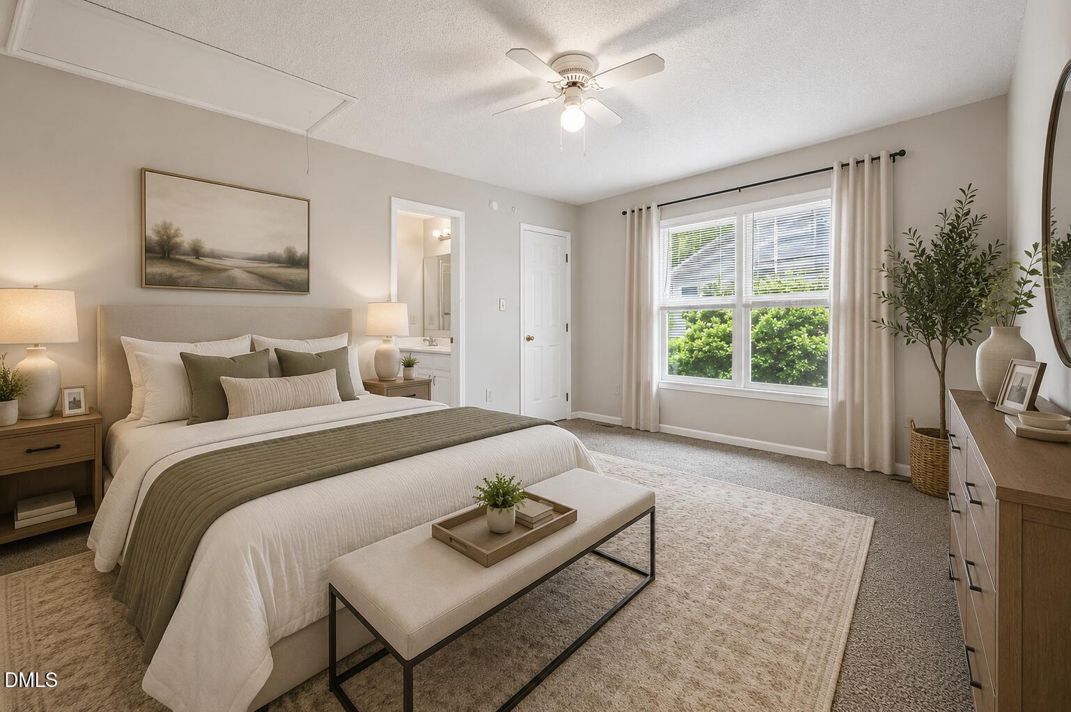 2800 West Jameson Road Raleigh, NC 27604 - Photo 6 of 28 a bedroom with a bed a couch and a window