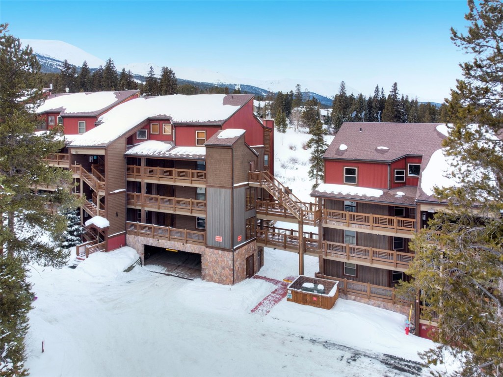 840 4 O Clock Road, Unit A1D Breckenridge, CO 80424 - Photo 15 of 38 a front view of a house with a yard