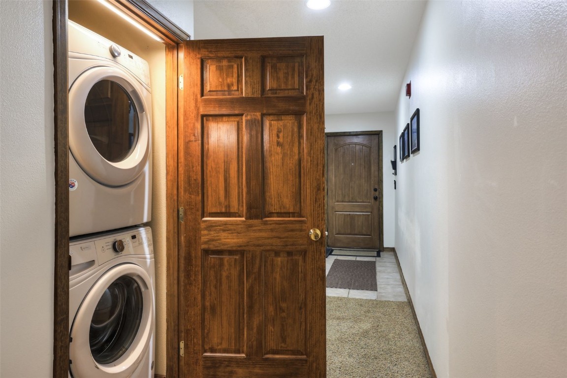 840 4 O Clock Road, Unit A1D Breckenridge, CO 80424 - Photo 23 of 38 a view of a hallway with washer and dryer