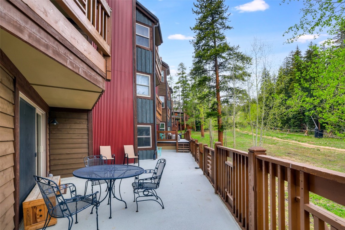 840 4 O Clock Road, Unit A1D Breckenridge, CO 80424 - Photo 25 of 38 a view of a chairs and table in the balcony