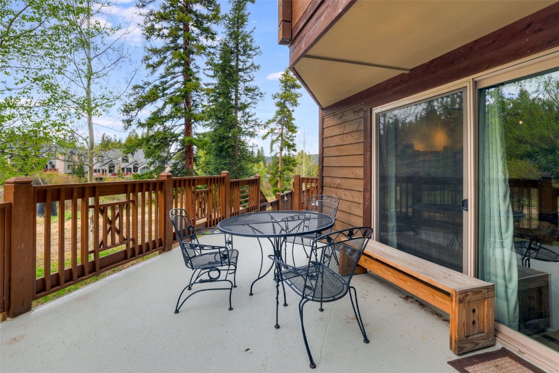 840 4 O Clock Road, Unit A1D Breckenridge, CO 80424 - Photo 26 of 38 a patio with table and chairs