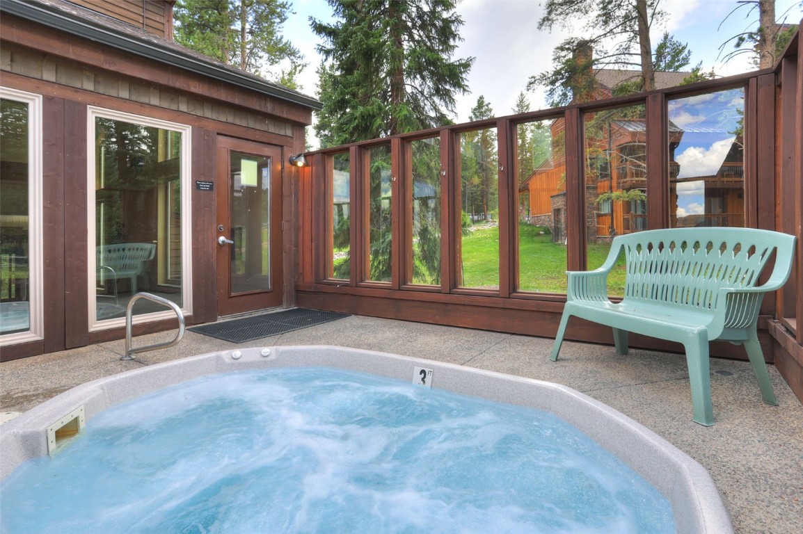 840 4 O Clock Road, Unit A1D Breckenridge, CO 80424 - Photo 36 of 38 a balcony with table and chairs