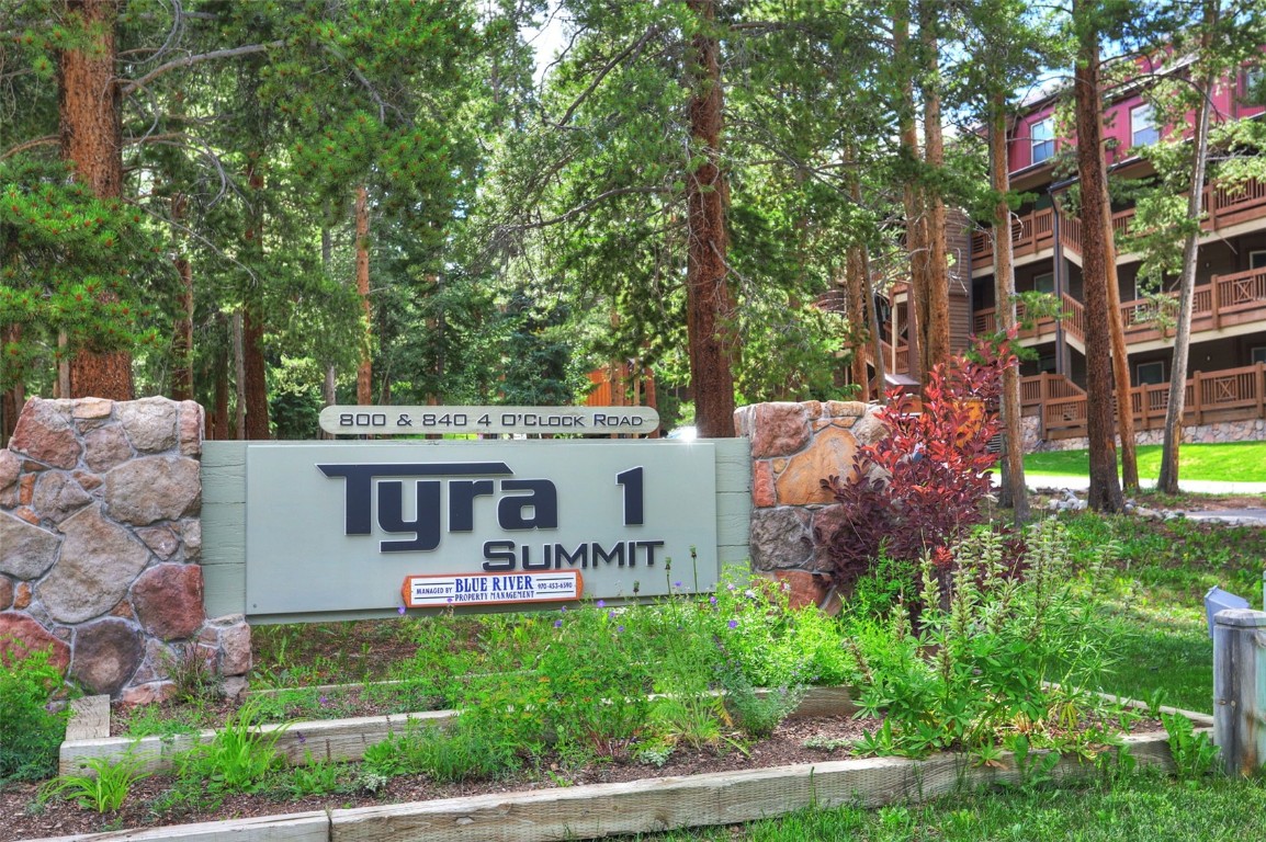 840 4 O Clock Road, Unit A1D Breckenridge, CO 80424 - Photo 38 of 38 front view of a house with a garden