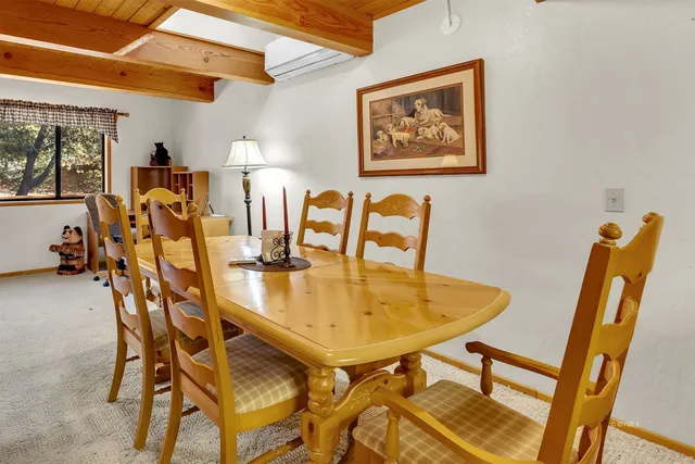 a kitchen with stainless steel appliances a refrigerator and cabinets