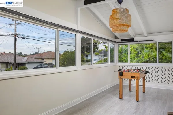 a room with furniture and a large window