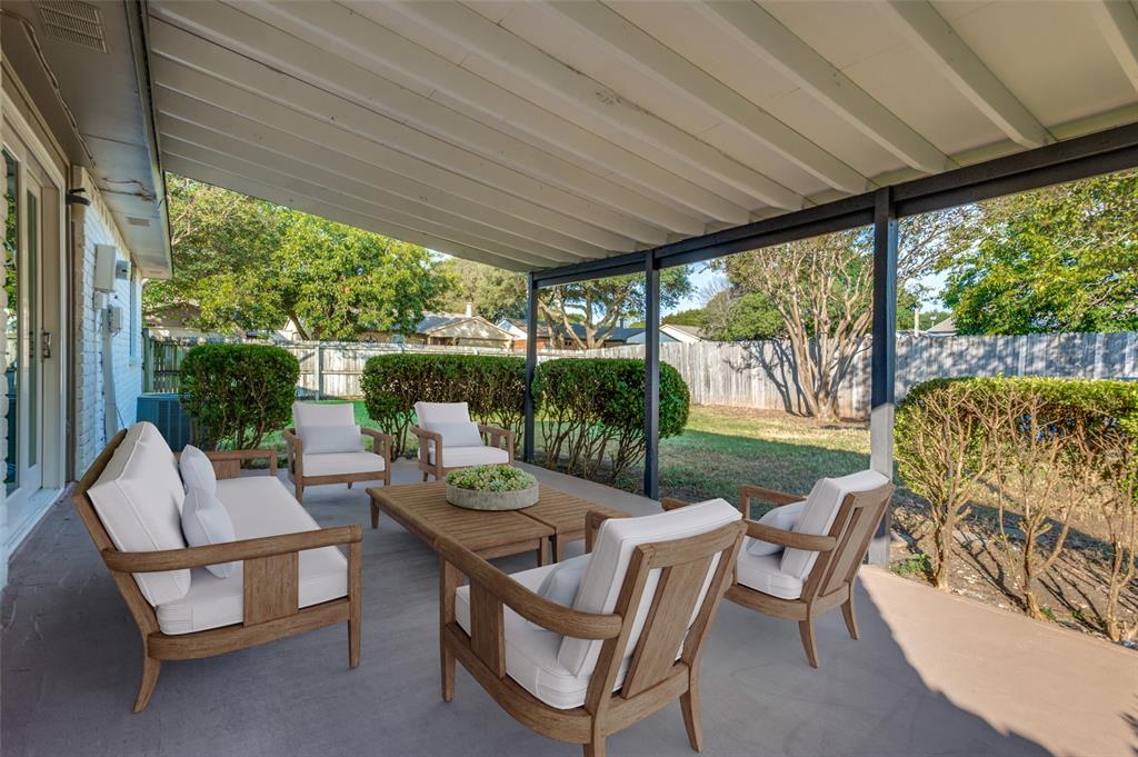 10257 Sweet Gum Street Dallas, TX 75249 - Photo 23 of 29 a patio with yard glass top table and chairs
