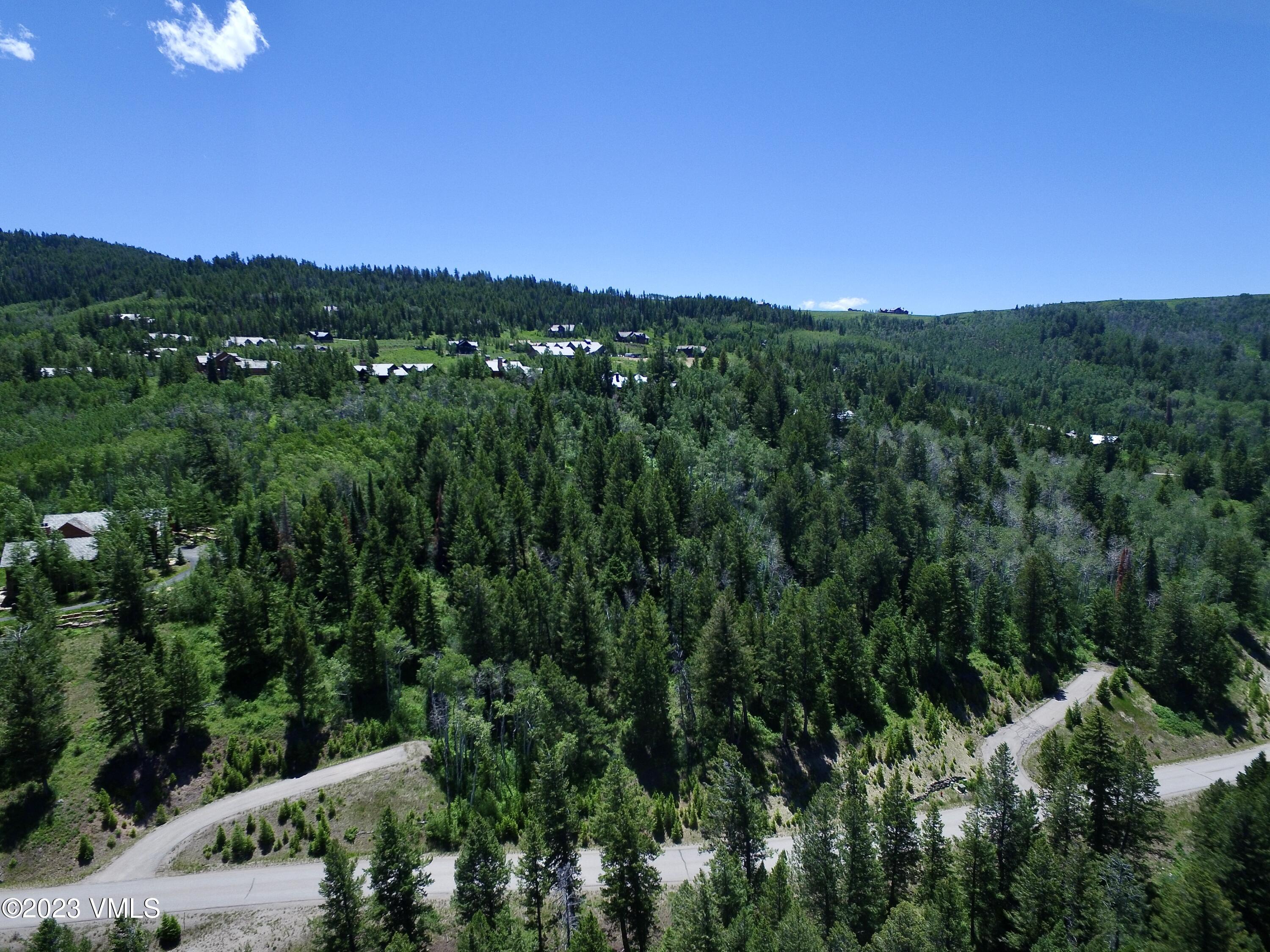 176 Sunquist Road Edwards, CO 81632 - Photo 12 of 19 a view of a city with lush green forest