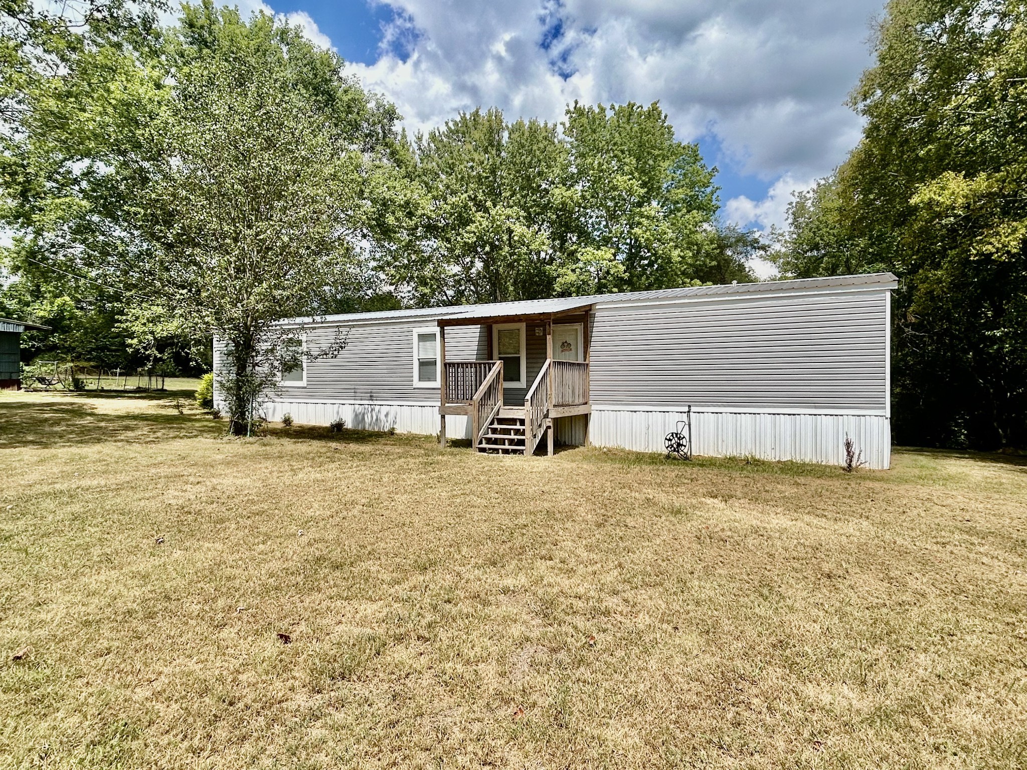 1359 Charley Davis Road Goodspring, TN 38460 - Photo 2 of 24 a house view with a backyard space