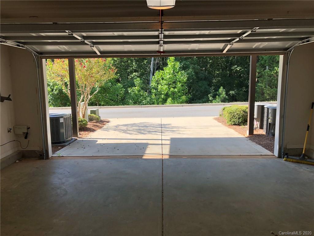 564 6th Baxter Crossing, Unit 13 Fort Mill, SC 29708 - Photo 22 of 39 a view of empty room with large windows