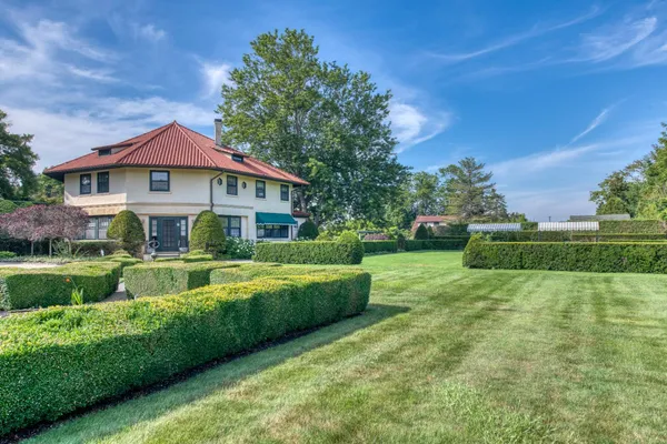 a view of house with outdoor space