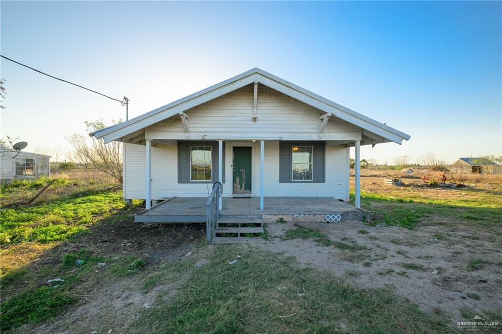 22790 Hooks E Hodges Road Santa Rosa, TX 78593 - Photo 1 of 1 Bungalow-style home with a porch