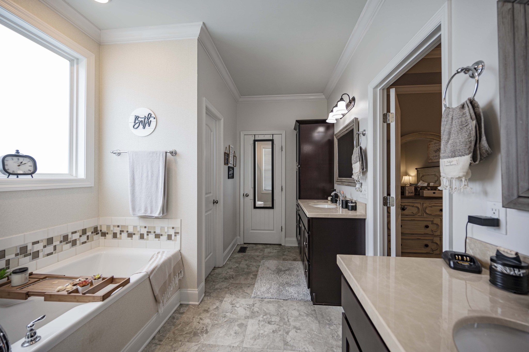 1632 Old Gallatin Road Portland, TN 37148 - Photo 26 of 37 a large bathroom with a tub sink and mirror