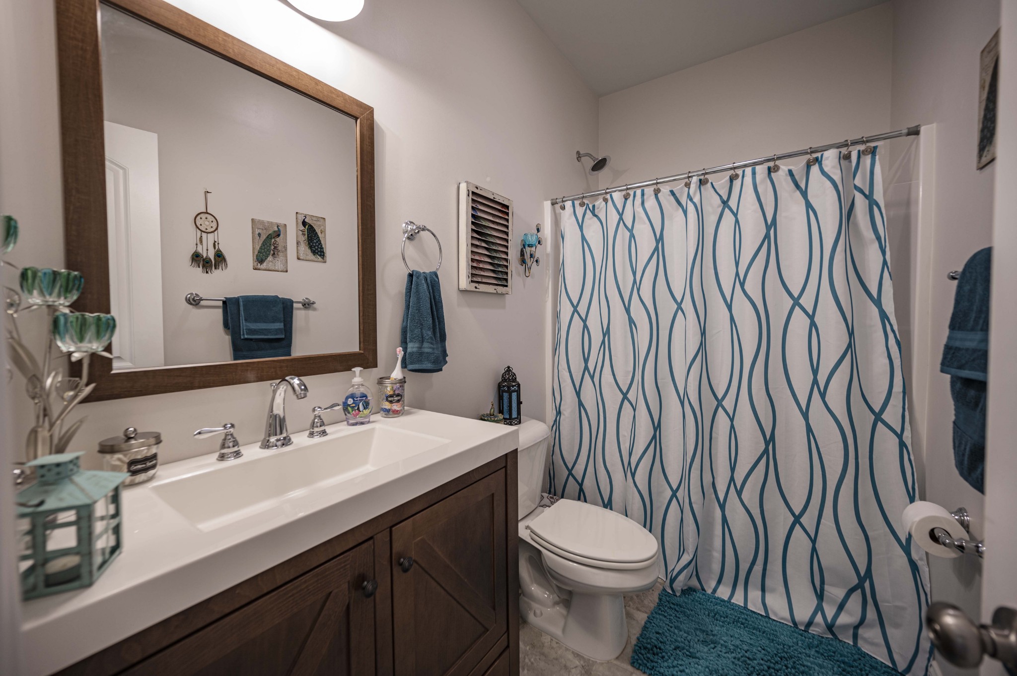 1632 Old Gallatin Road Portland, TN 37148 - Photo 29 of 37 a bathroom with a sink a toilet and a mirror