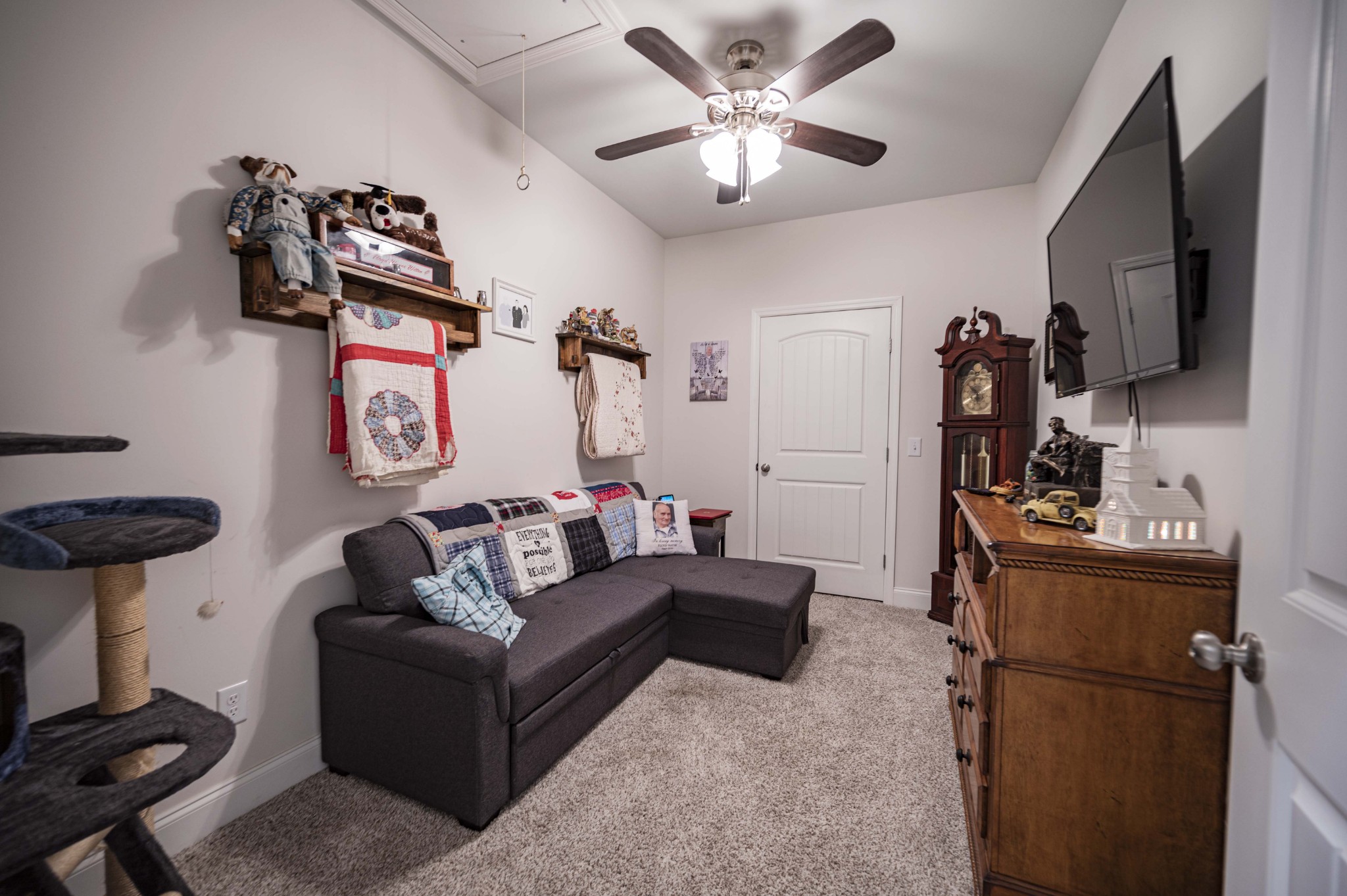 1632 Old Gallatin Road Portland, TN 37148 - Photo 30 of 37 a living room with furniture and a flat screen tv