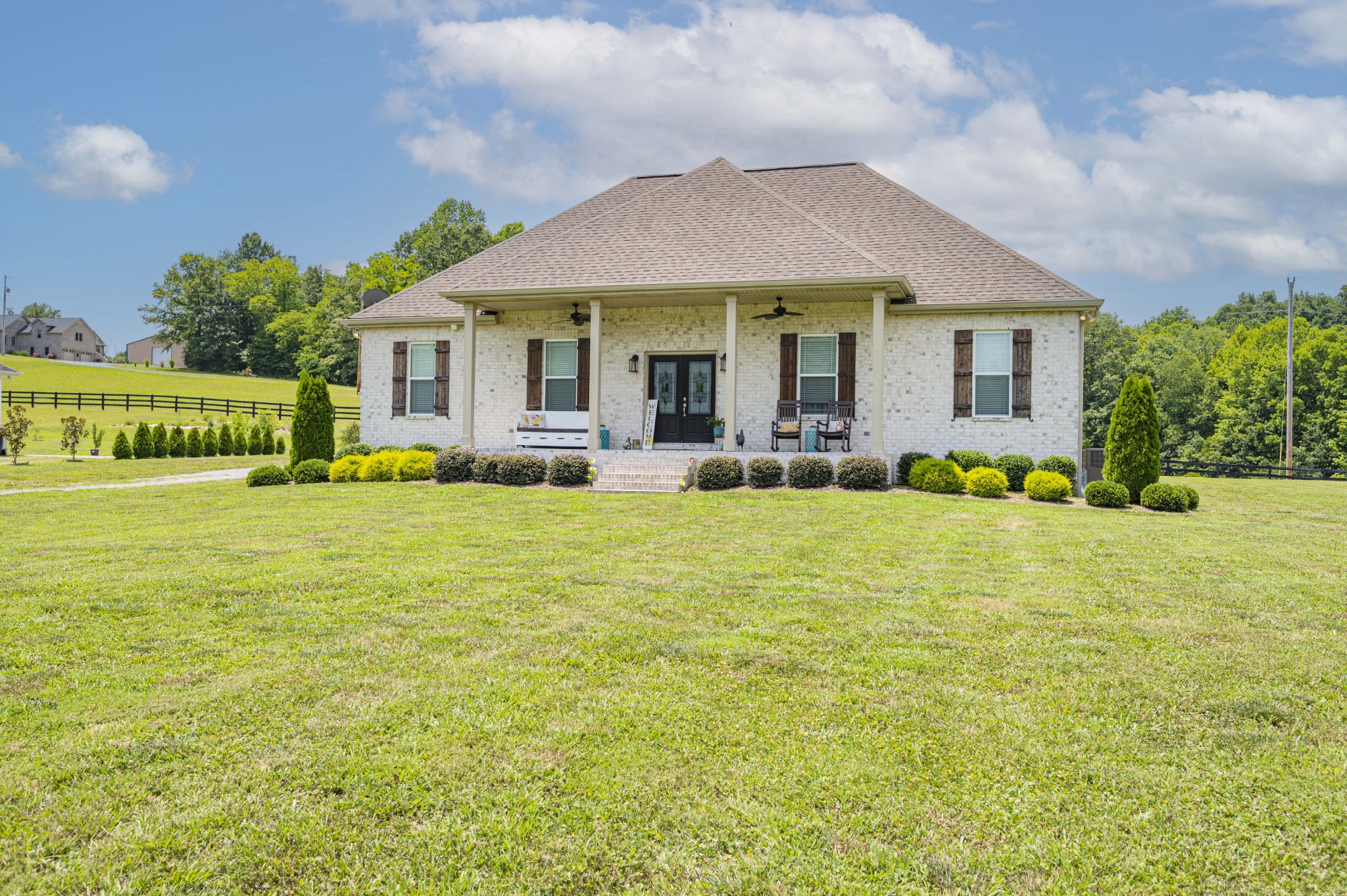 1632 Old Gallatin Road Portland, TN 37148 - Photo 3 of 37 a front view of house with yard and outdoor seating