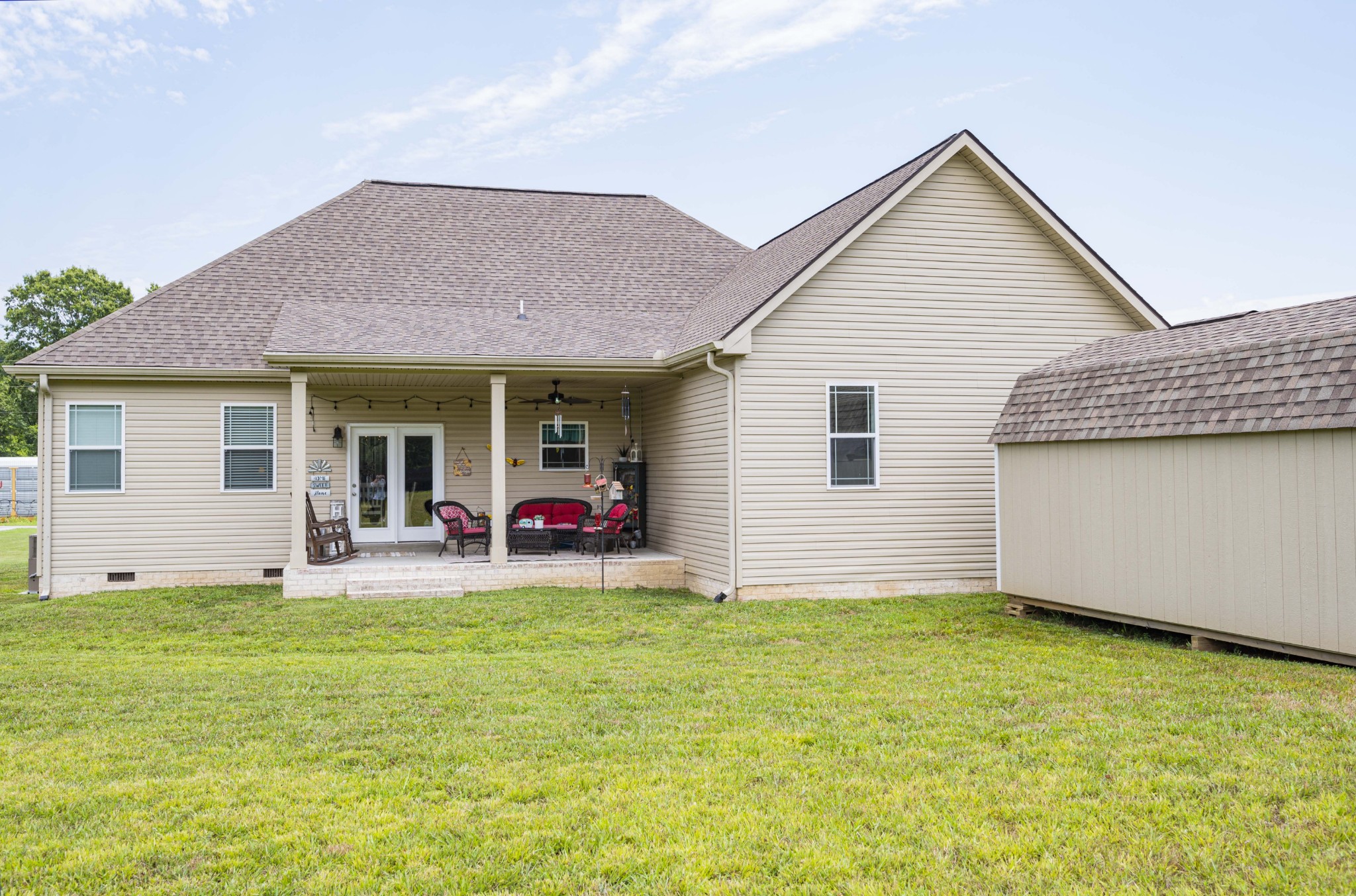 1632 Old Gallatin Road Portland, TN 37148 - Photo 33 of 37 a view of a house with patio and a yard