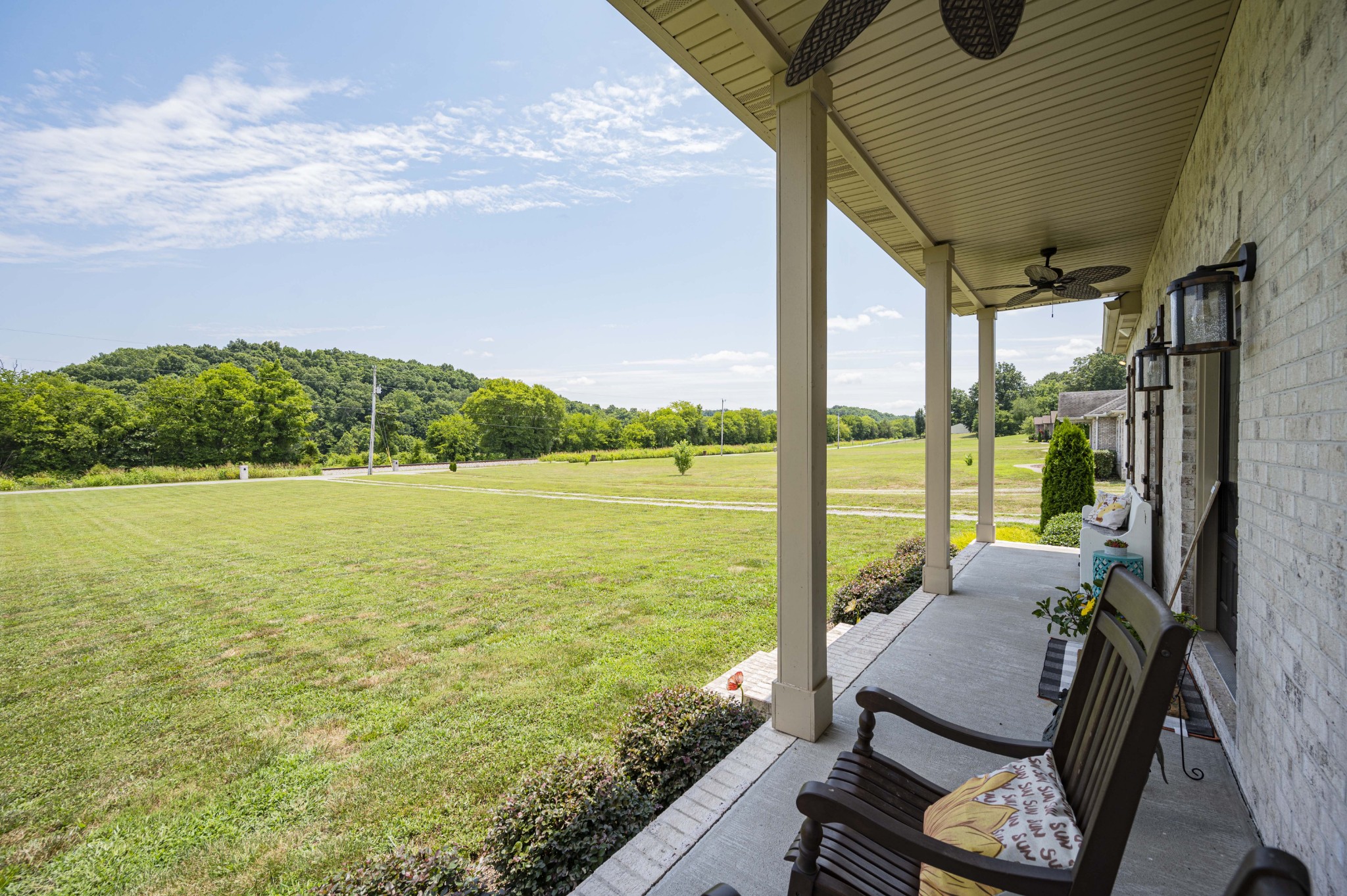 1632 Old Gallatin Road Portland, TN 37148 - Photo 5 of 37 a view of a balcony with chair and table