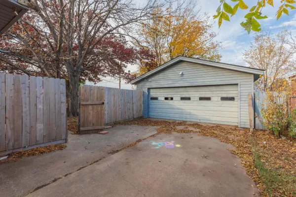 a front view of a house with a garage
