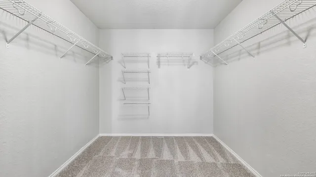 a view of a room with racks on the wall