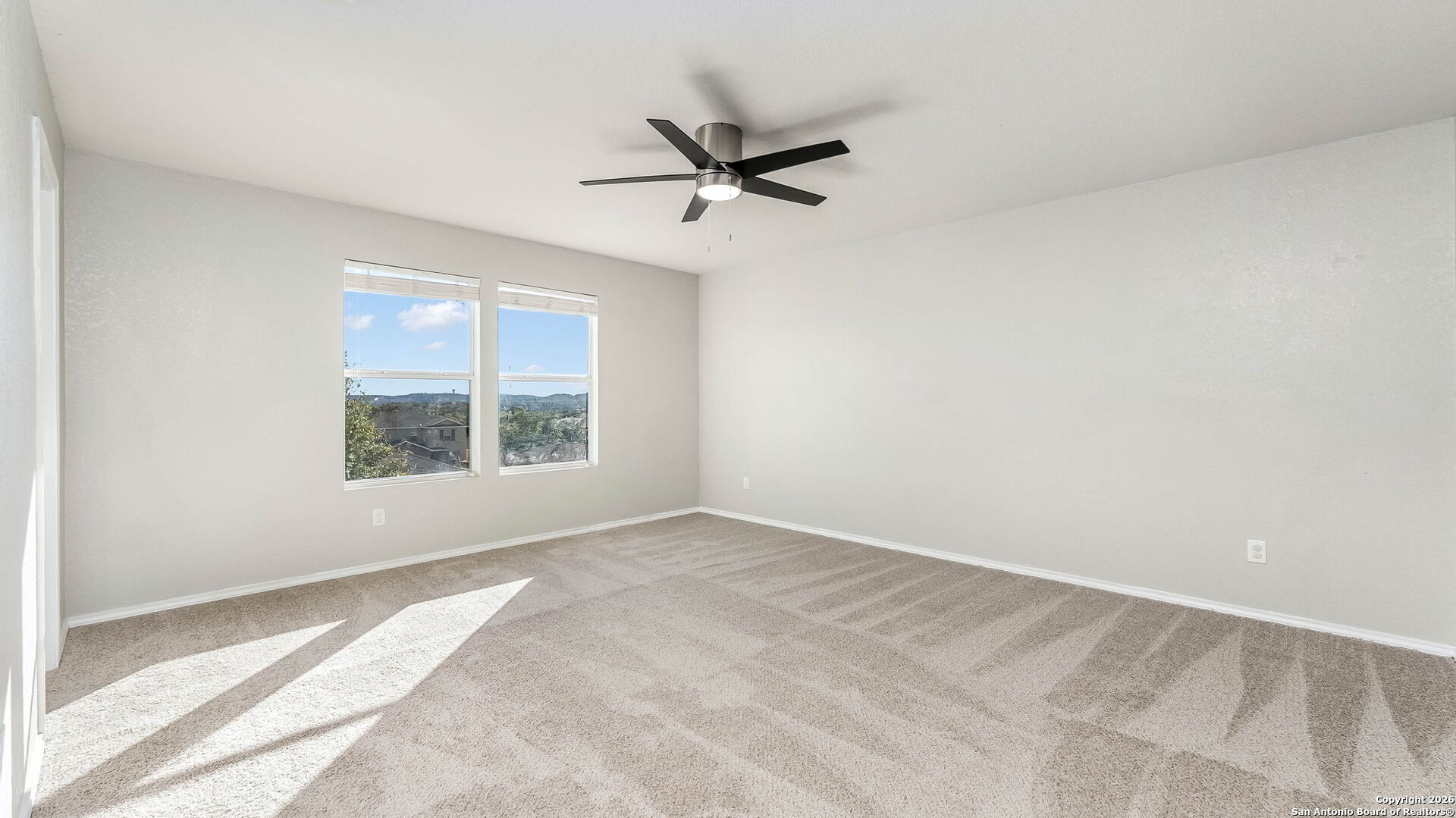 7690 Paraiso Boerne, TX 78015 - Photo 16 of 24 a view of an empty room with a window