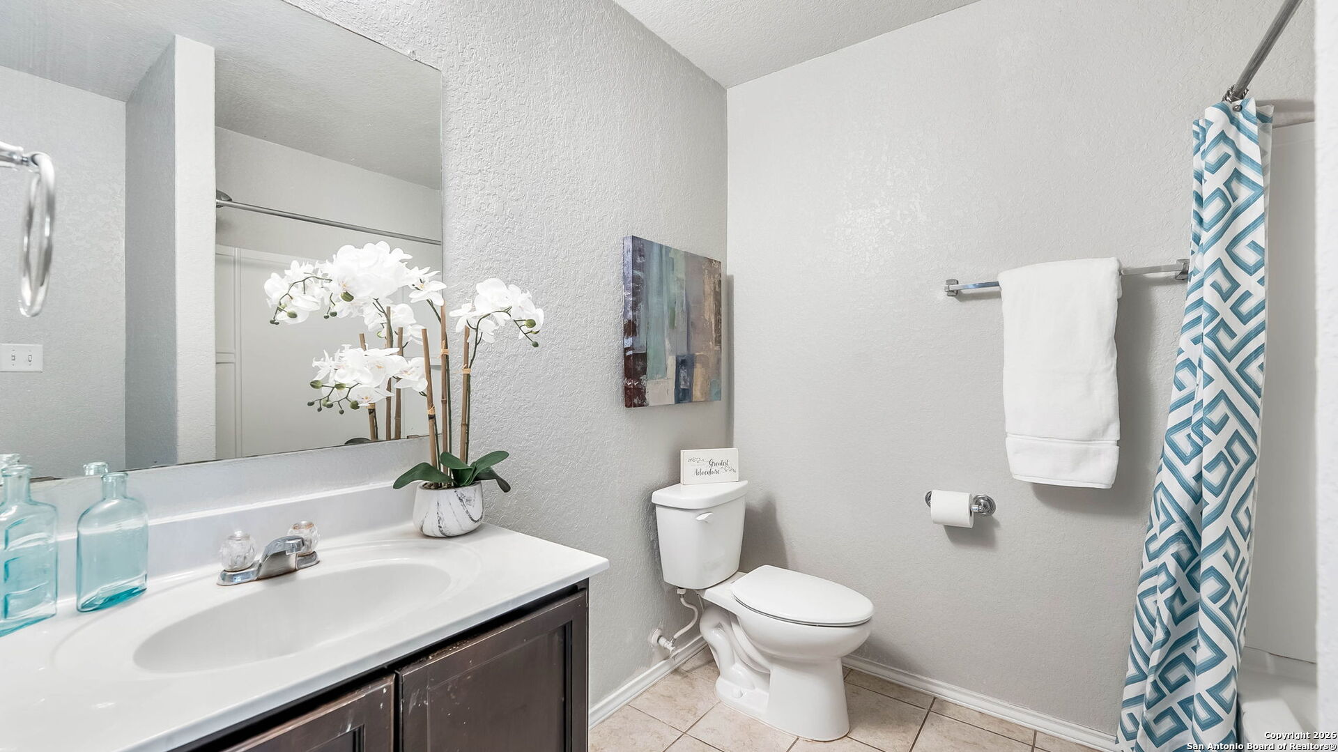 7690 Paraiso Boerne, TX 78015 - Photo 17 of 21 a bathroom with a sink toilet and shower