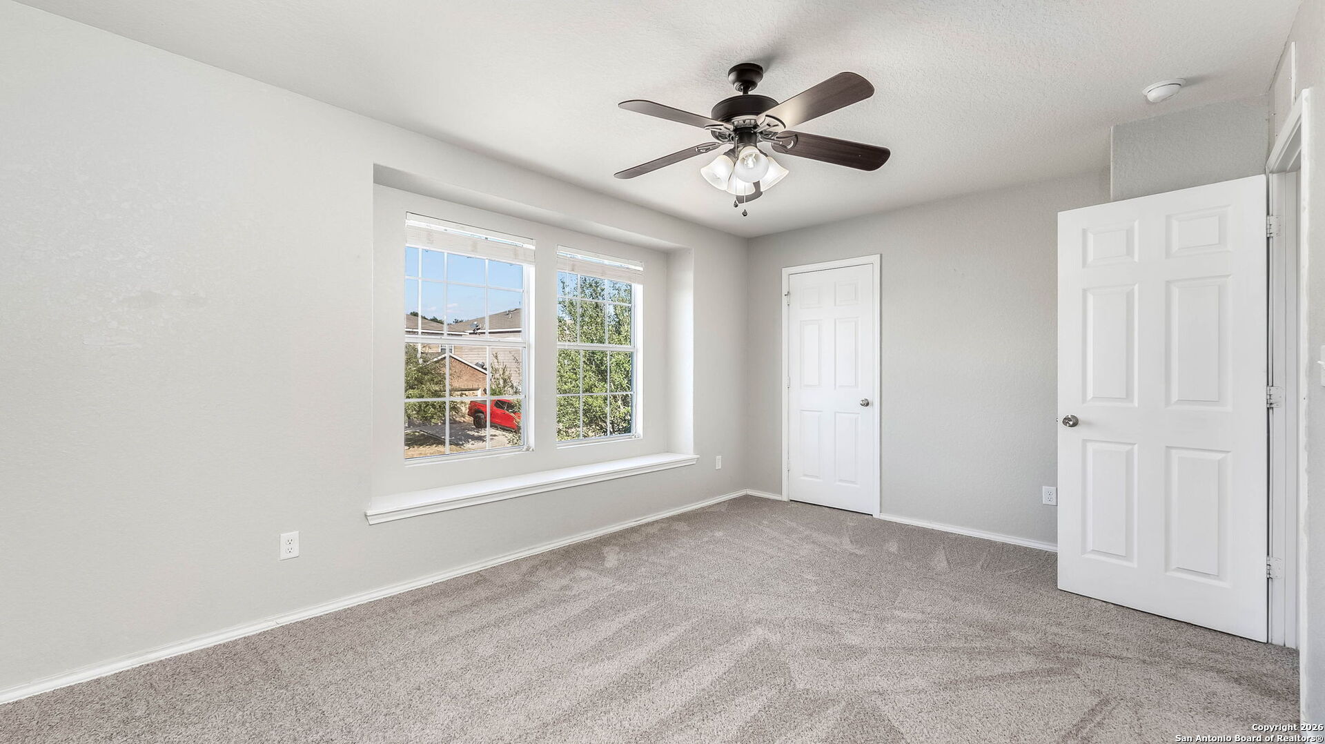 7690 Paraiso Boerne, TX 78015 - Photo 19 of 21 a view of an empty room with a window