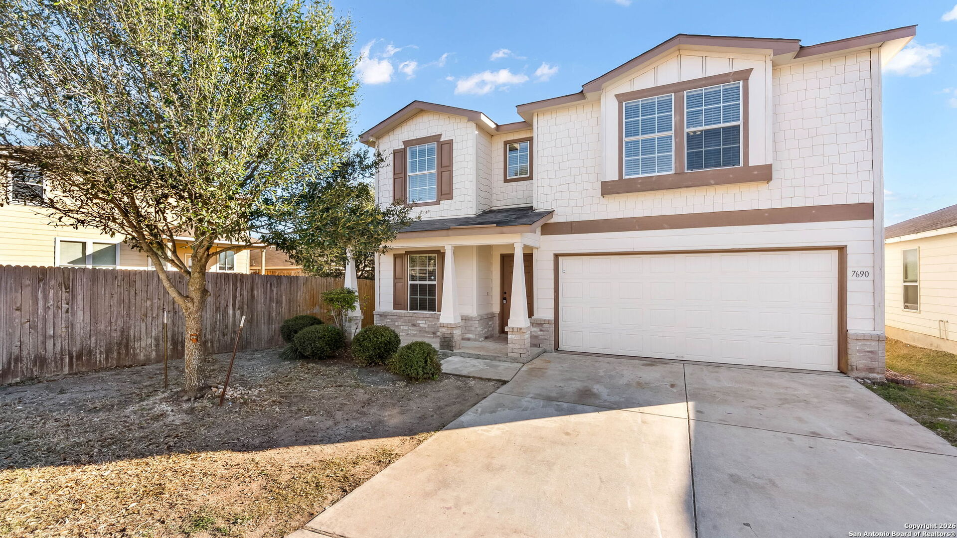 7690 Paraiso Boerne, TX 78015 - Photo 22 of 24 a front view of a house with garden