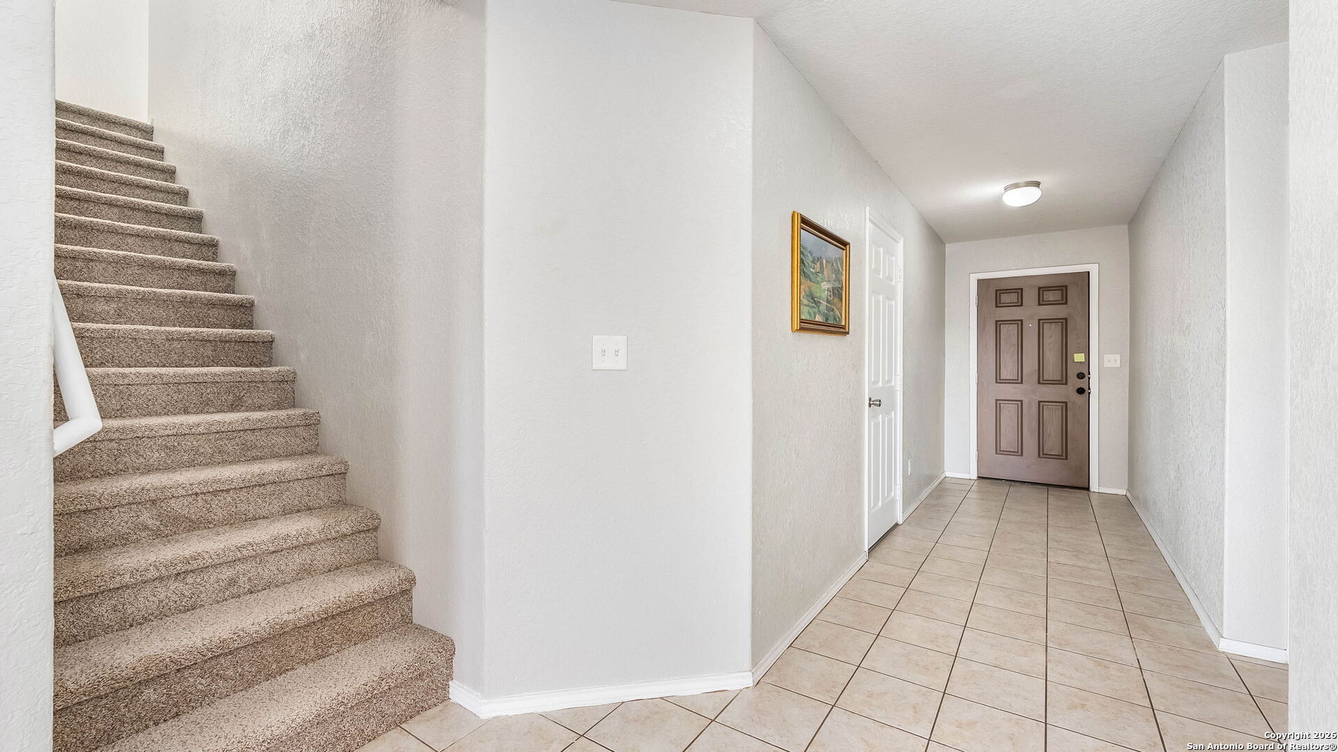 7690 Paraiso Boerne, TX 78015 - Photo 3 of 24 a view of an entryway with staircase