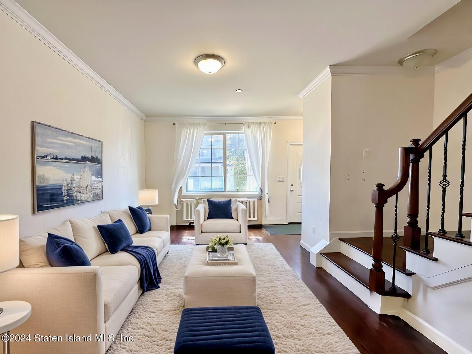 94 Catherine Street Staten Island, NY 10302 - Photo 13 of 33 a living room with furniture and a window