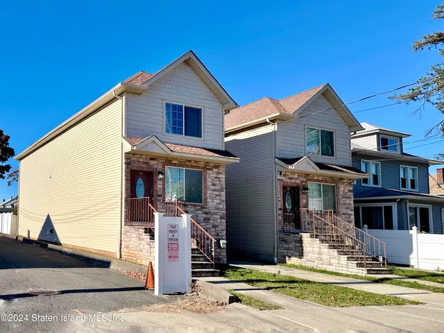 a view of a house with a swimming pool