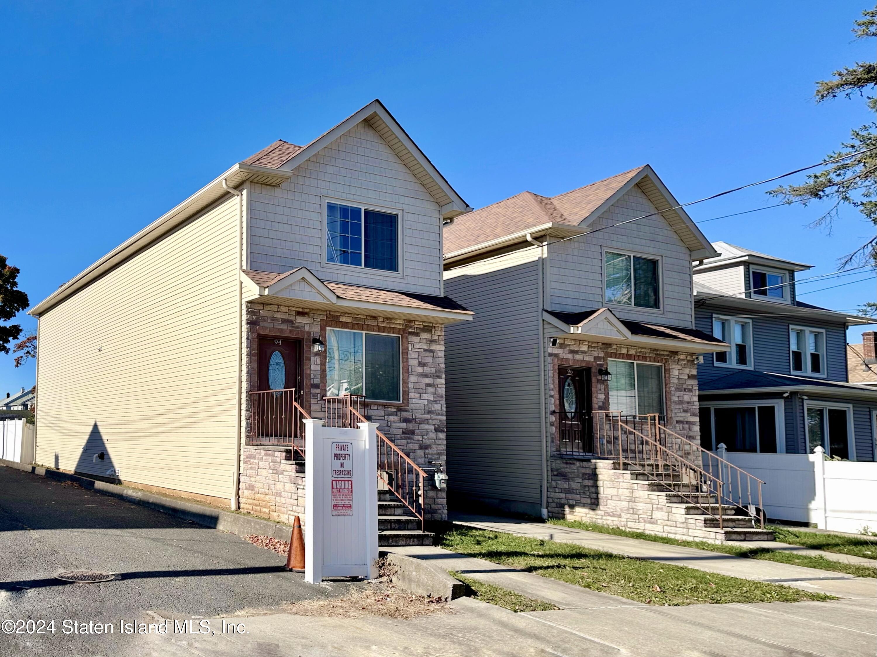 94 Catherine Street Staten Island, NY 10302 - Photo 2 of 33 a view of a house with a swimming pool