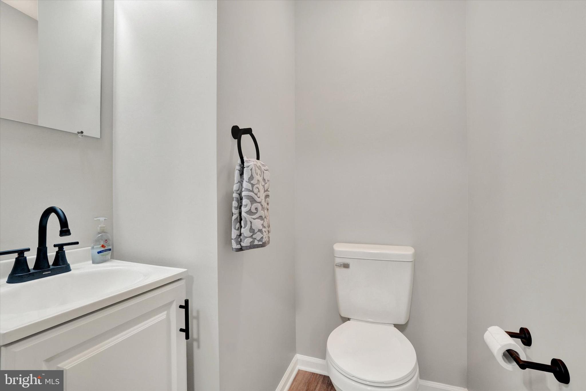 1606 Condor Lane Dover, PA 17315 - Photo 9 of 28 a bathroom with a toilet sink and mirror
