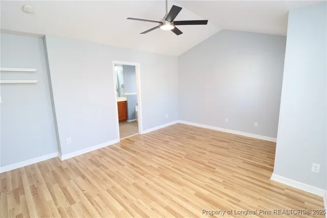 a view of a livingroom with a ceiling fan