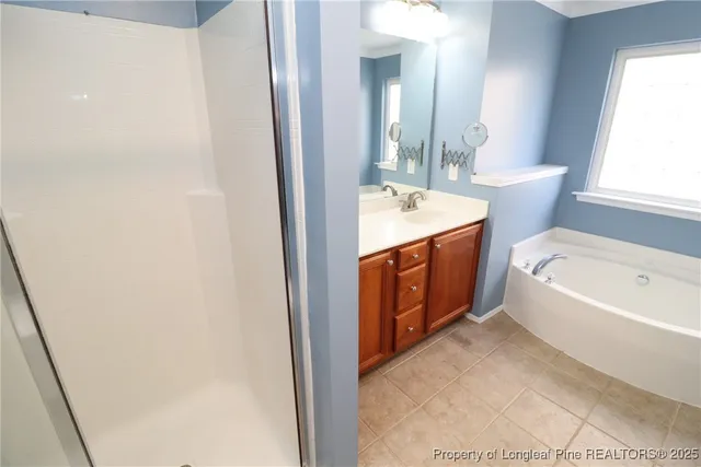 a bathroom with a bathtub and a sink