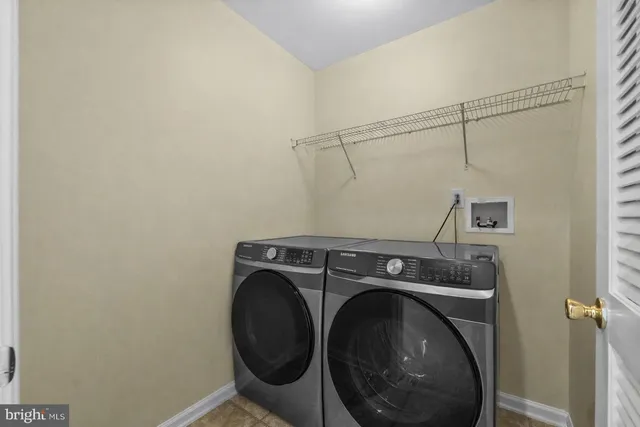 a view of hallway with wooden floor