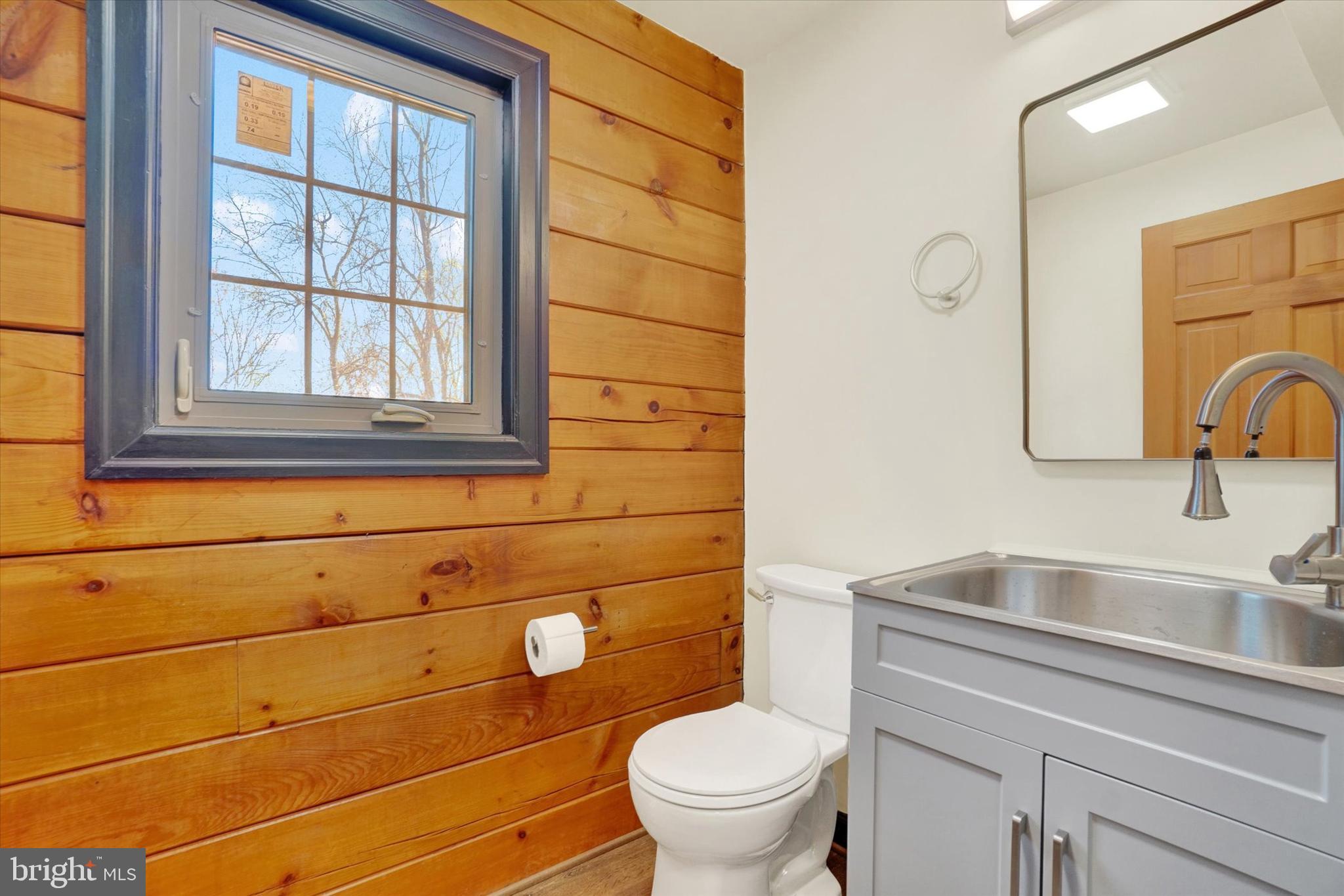 5601 Crone Road Dover, PA 17315 - Photo 12 of 53 a bathroom with a sink a toilet and a mirror
