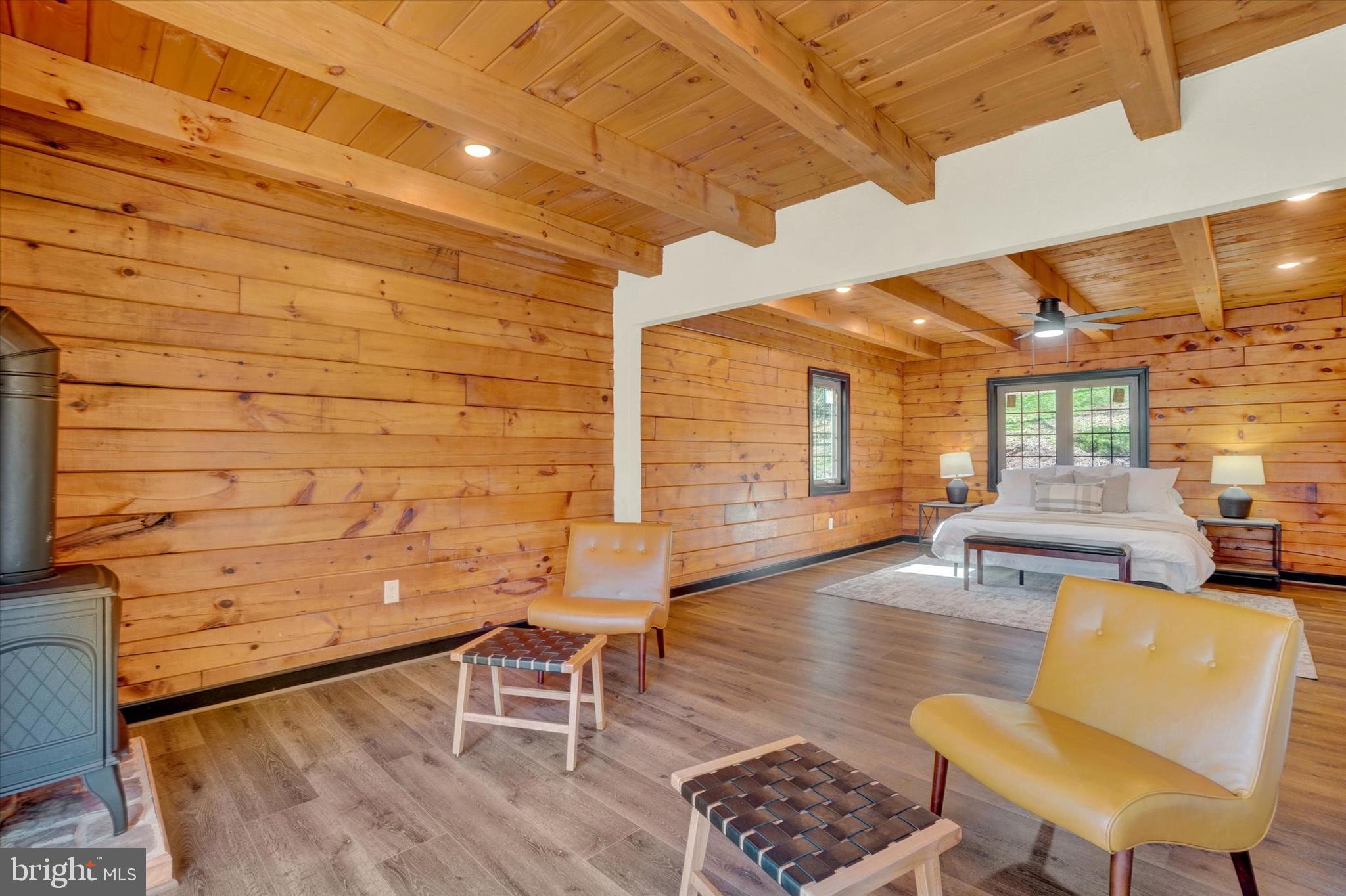 5601 Crone Road Dover, PA 17315 - Photo 18 of 53 a view of a patio with couches chairs and wooden floor