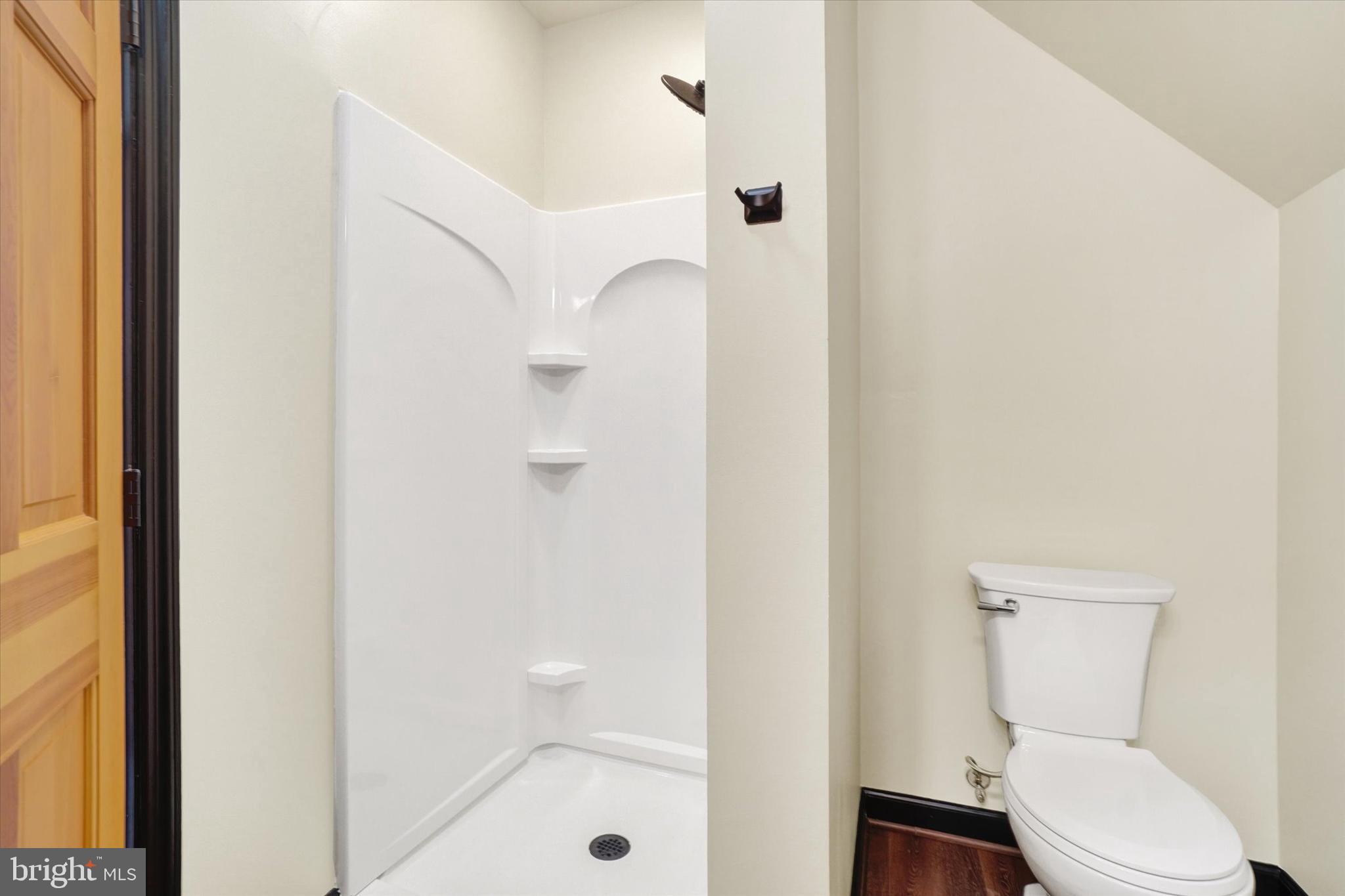 5601 Crone Road Dover, PA 17315 - Photo 27 of 53 a white toilet sitting next to a bathroom sink