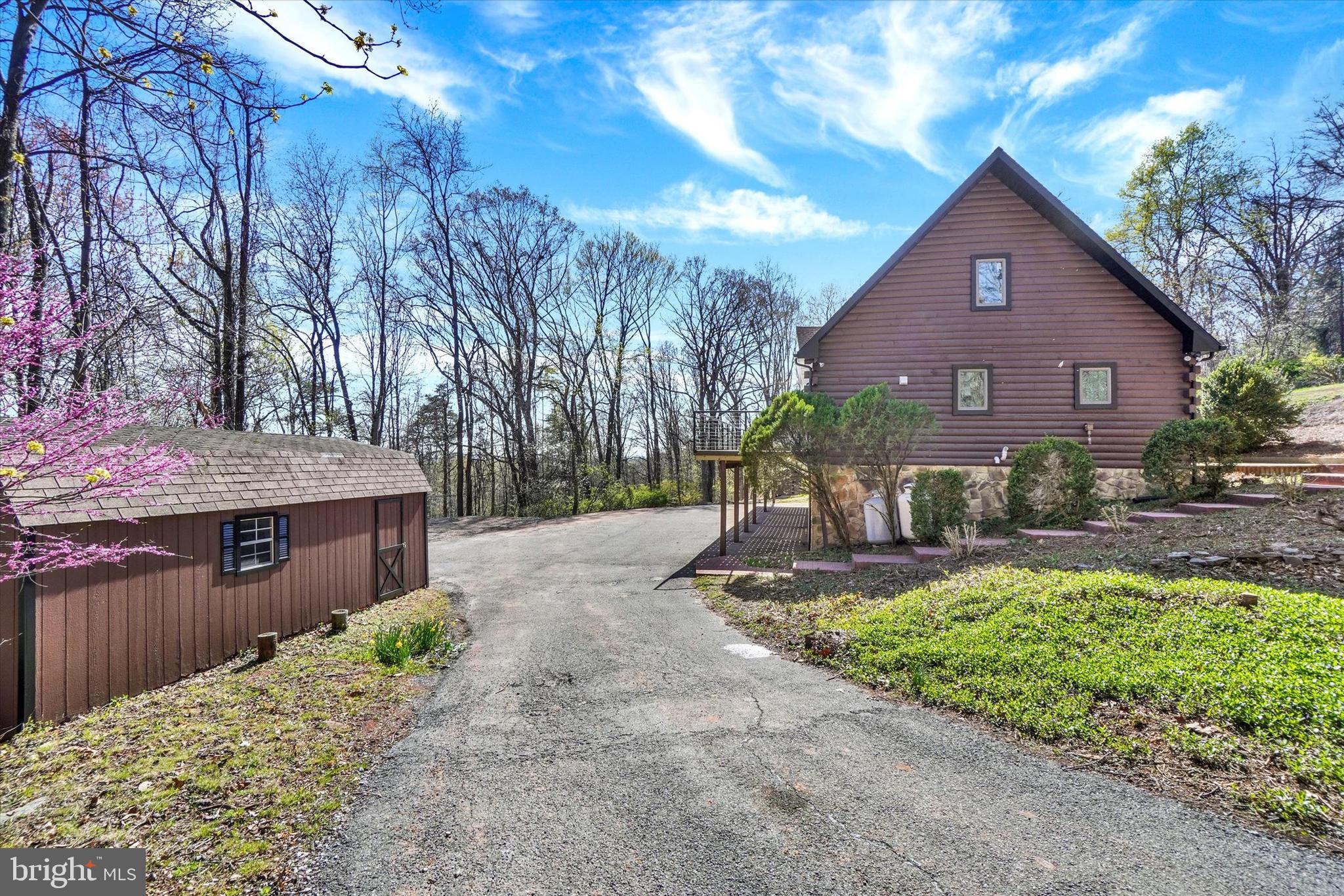 5601 Crone Road Dover, PA 17315 - Photo 4 of 53 a front view of a house with a yard and garage