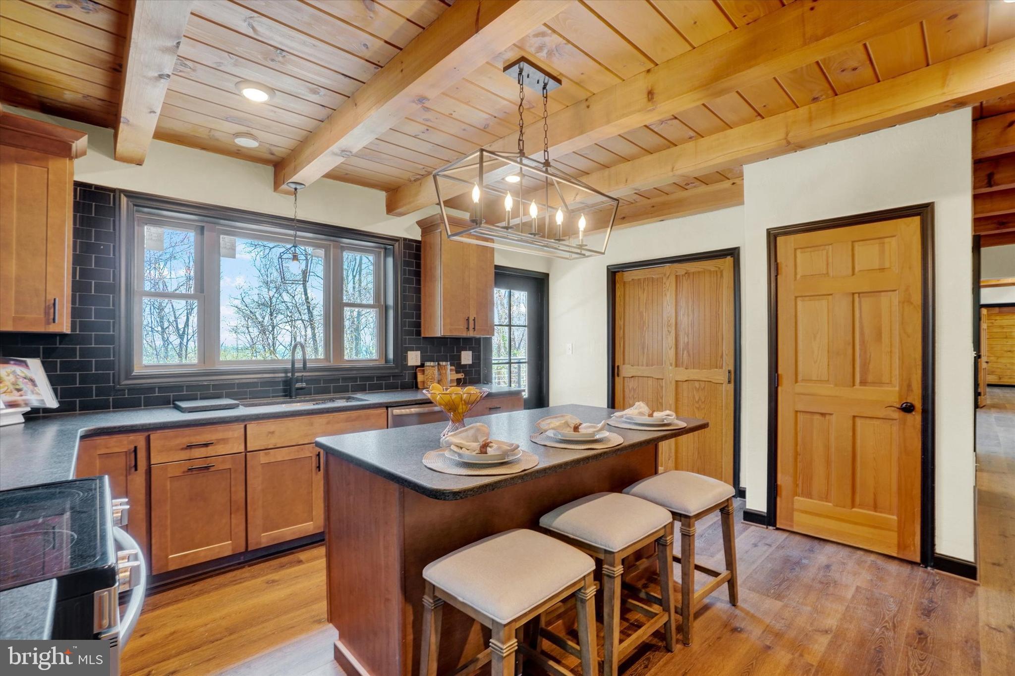 5601 Crone Road Dover, PA 17315 - Photo 6 of 53 a view of a dining room with furniture window and wooden floor
