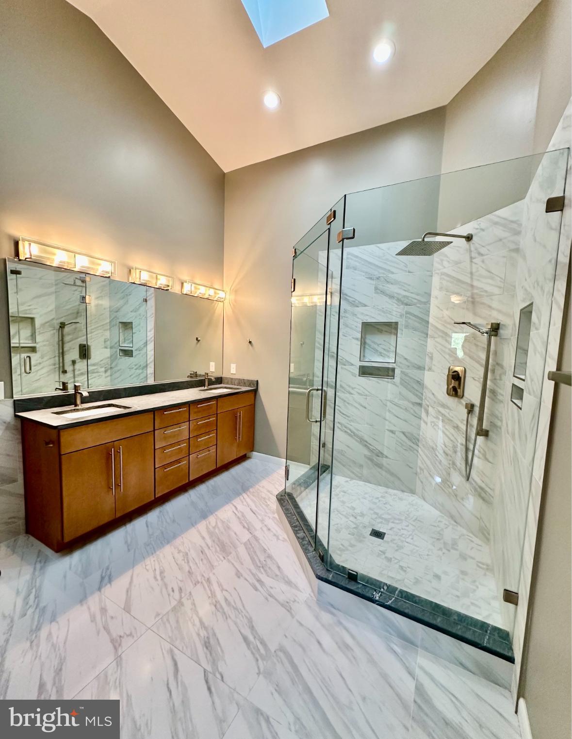1969 Lakeport Way Reston, VA 20191 - Photo 6 of 11 a bathroom with a tub a mirror and a shower