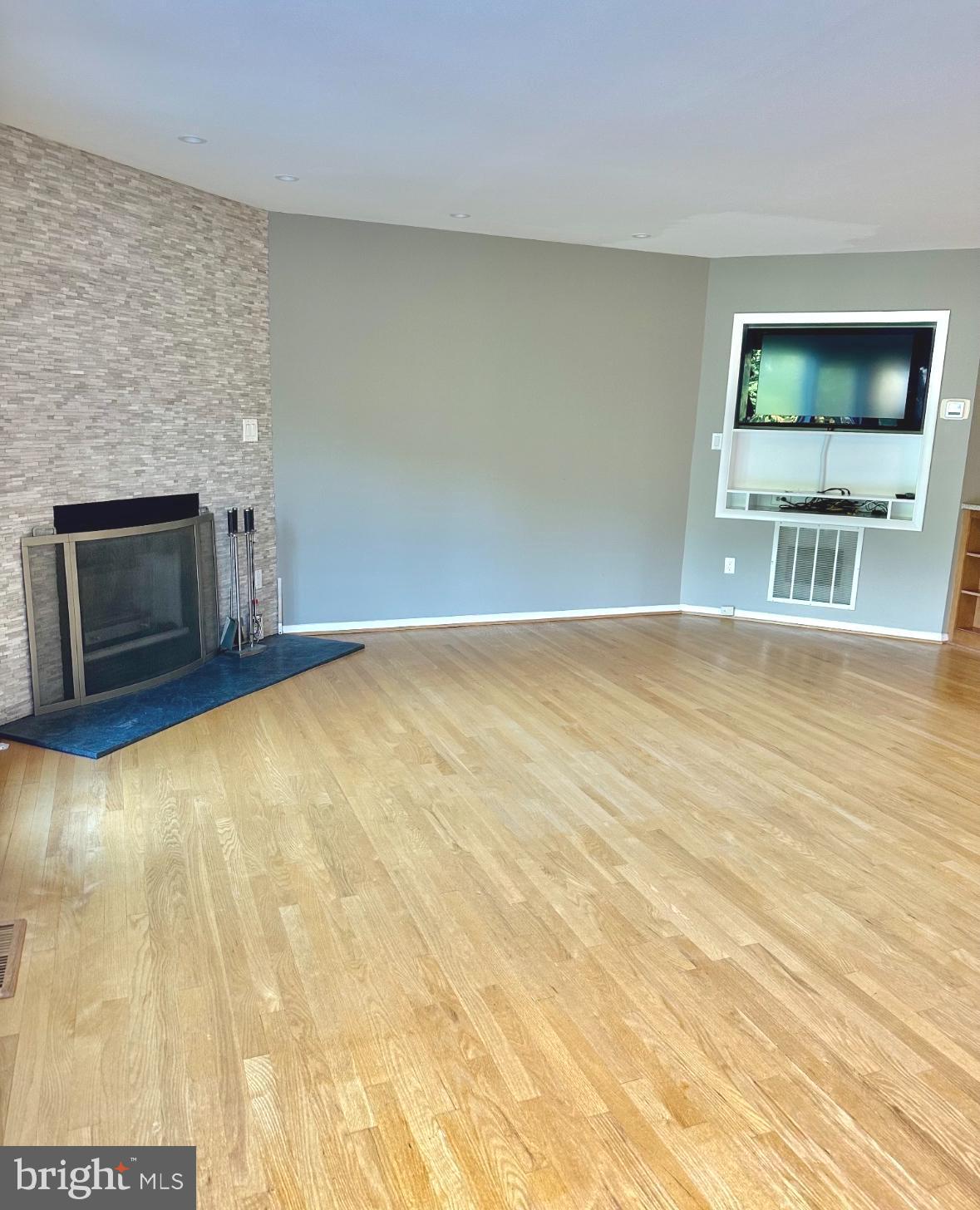 1969 Lakeport Way Reston, VA 20191 - Photo 10 of 11 a view of an empty room with a fireplace
